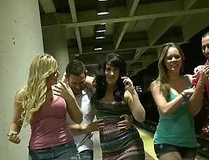 Three hot sluts start orgy in public while waiting for the acquaint