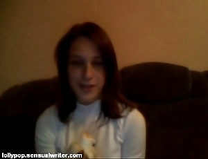 Russian teen sucks banana atop webcam, softcore